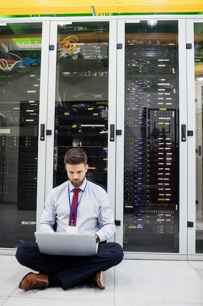 Technician using laptop