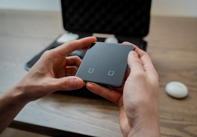 A technician works with a demo kit of the smart home system