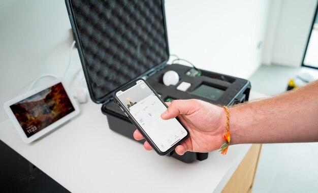 A technician works with a demo kit of the smart home system