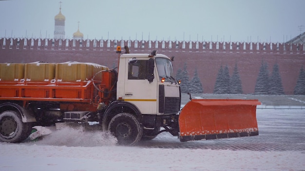 Photo technique removes snow from red square kamaz clears snow from the red square in moscow