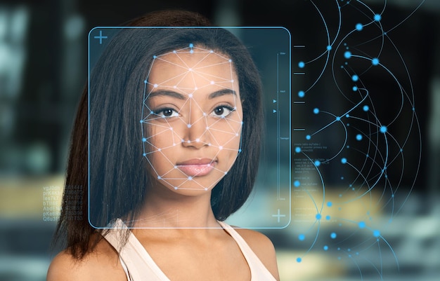 Foto scansione tecnologica del volto di una bellissima giovane donna