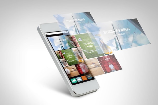 technology, business, electronics, internet  and media concept - white smarthphone with news web page and application icons on screen