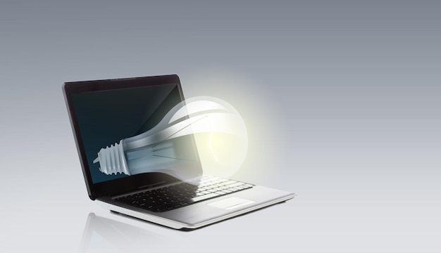 Photo technology, business, idea and startup concept - laptop computer with light bulb