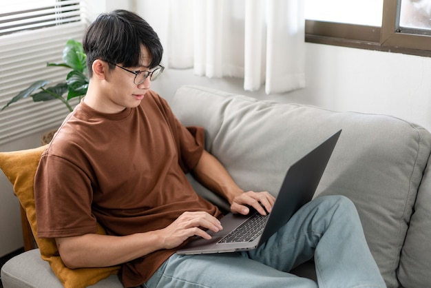 Technology Concept The man that is putting on glasses leaning his back