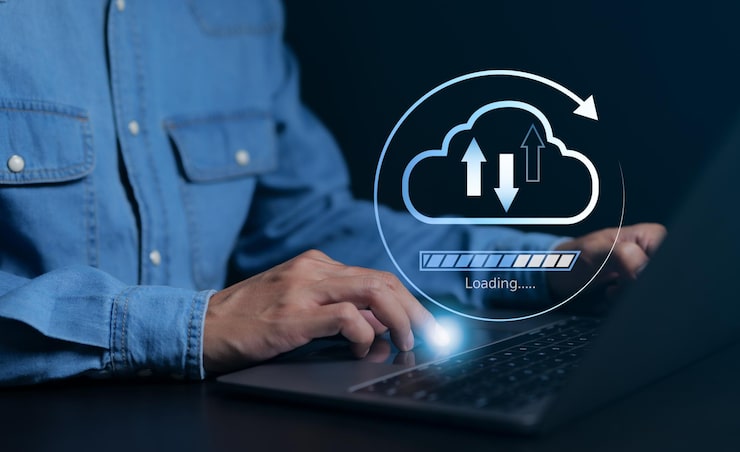 Photo technology data transformation concept businessman using computer with virtual glowing cloud computing to download and loading data information and upload on system network application data transfer