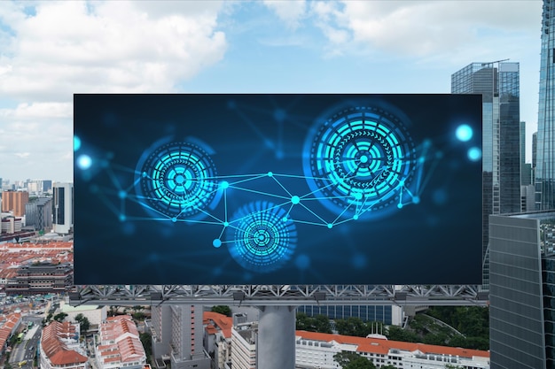 Technology hologram on billboard over panorama city view of\
singapore the largest tech hub in southeast asia the concept of\
developing coding and hightech science