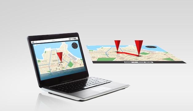 technology, navigation, location and advertisement concept - laptop computer with gps navigator map on screen