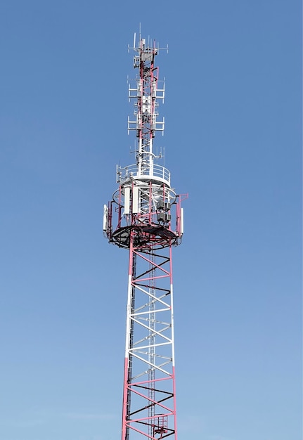 Technology on the top of the telecommunication gsm 5g4g tower\
with copy spacecellular phone antennas on a building\
rooftelecommunication mast television antennasdevelopment\
communication system