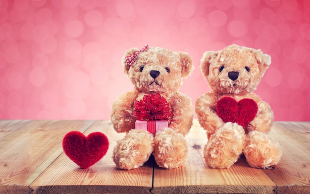 Teddy bear holding a heart-shaped