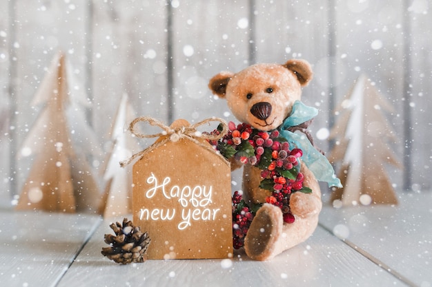 Photo teddy bear with blank forms for congratulations