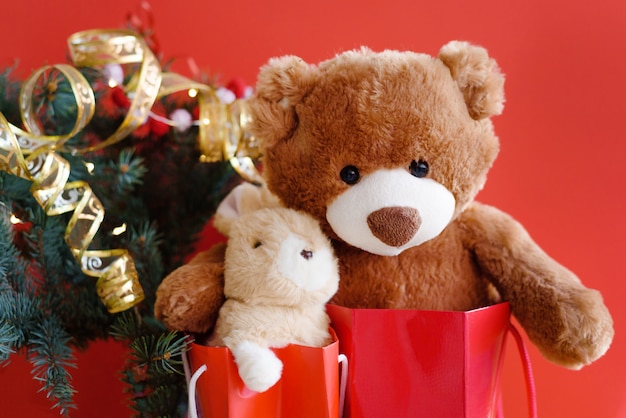 Teddy bear with holiday decoration and presents 