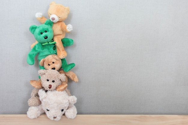 teddy bears are playing in a row with a happy feel