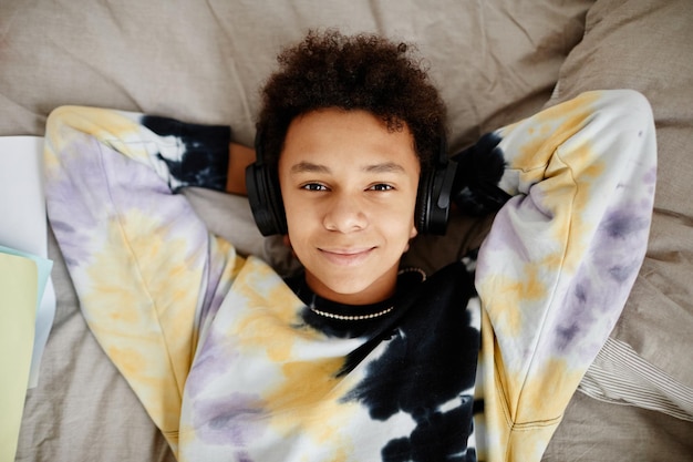 Teen Boy Lying on Bed