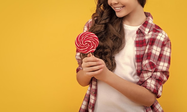 Teen dental care sweet tooth yummy happy girl hold lollipop lollipop child