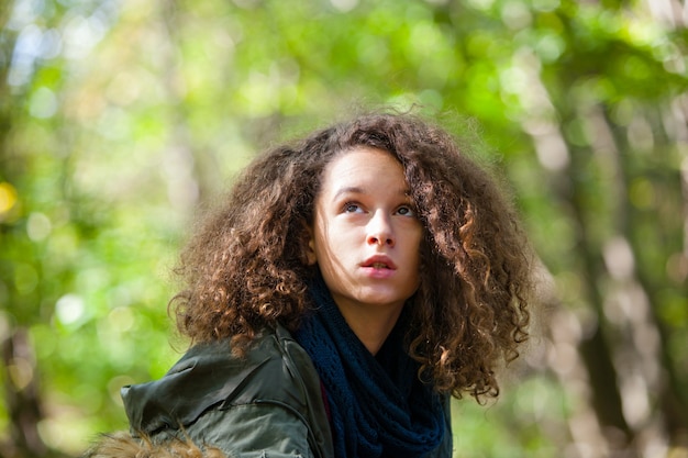 Teen girl in autumn park