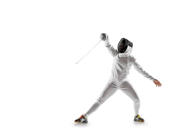 Teen girl in fencing costume with sword in hand isolated on white background