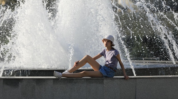 teen girl at the fountain