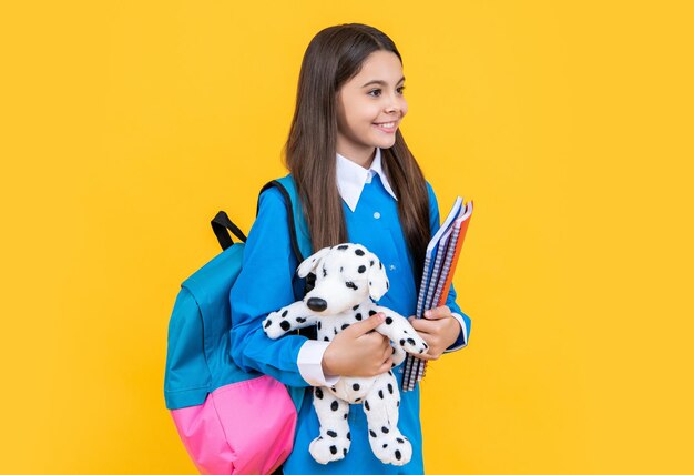 teen girl hold toy of her childhood study at college back to school childhood and education college student girl teen girl gets high education education in school study at school