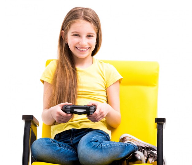 Teen girl holding joystick for computer games