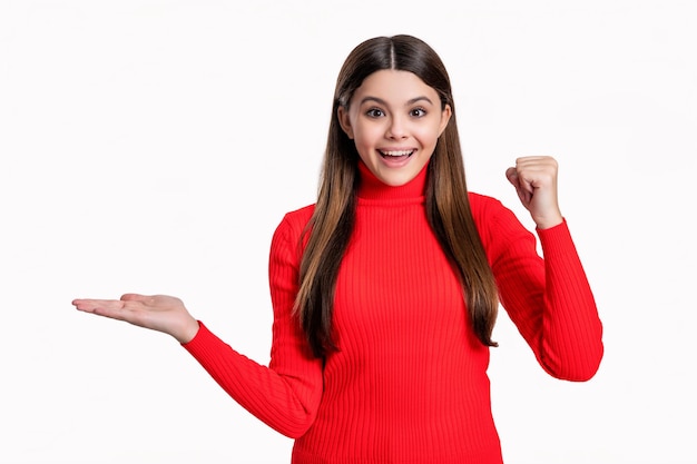 teen girl portrait isolated on white background presenting product portrait of teen girl in studio photo portrait of teen girl having brunette hair teen girl portrait in sweater