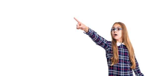 Teen girl in school uniform and eyewear pointing finger isolated on white background teen school girl wear eyewear in studio teen girl wear school eyewear photo of school teen girl with eyewear