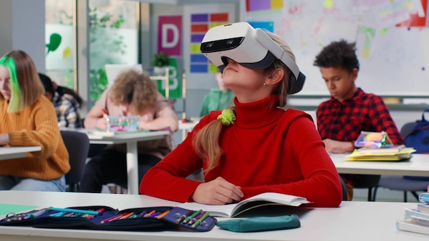 Teen girl study in vr headset in classroom