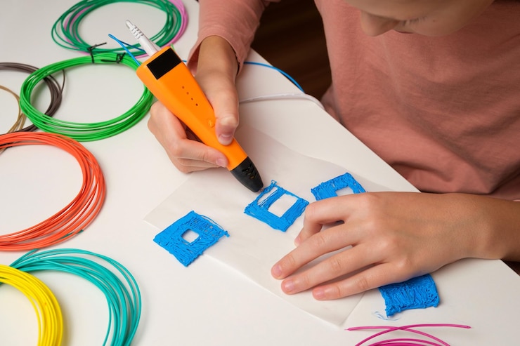 Photo teen girl using 3d pen robotics steam stem education modern technologies play and study at home