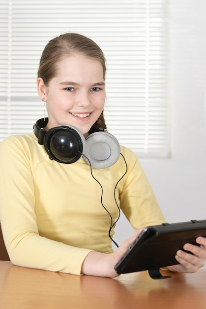 Teen girl using tablet