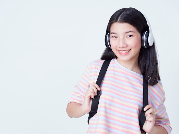 Teen girl while listening to music