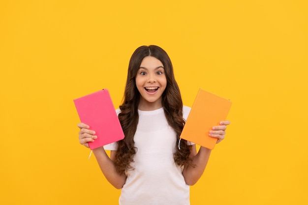 Teen girl with book kid planning her study student prepare for exam schoolgirl do homework