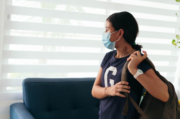 Teen ready for school in pandemic season. Concept went back to school