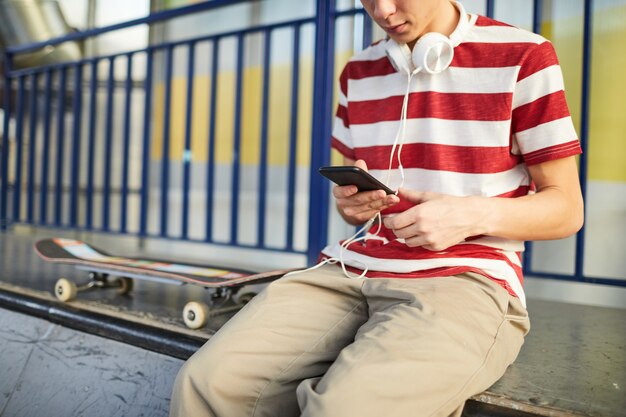 Teen skateboarder chilling