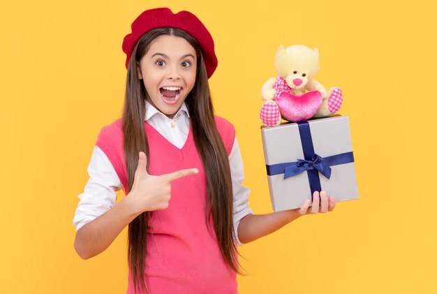 Teenage beauty go shopping tween and youth purchase a gift happy french teen girl pointing finger