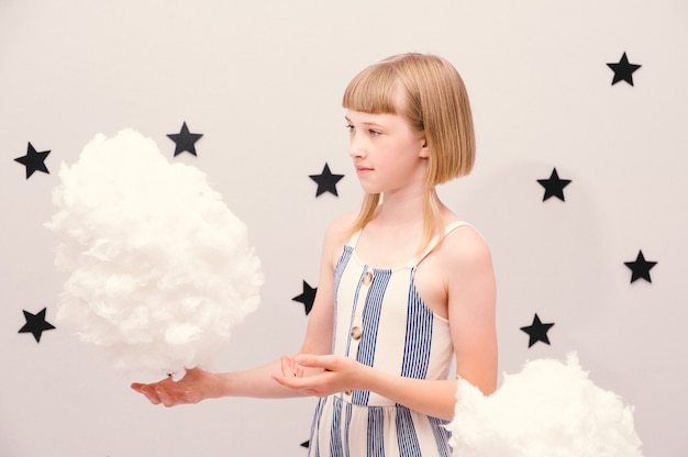 Teenage girl in the clouds: conceptual metaphorical image