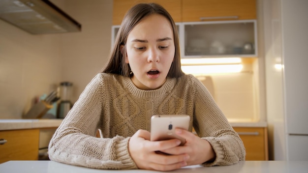 Photo teenage girl got upset and stressed after receiving negative information or abuse in social media