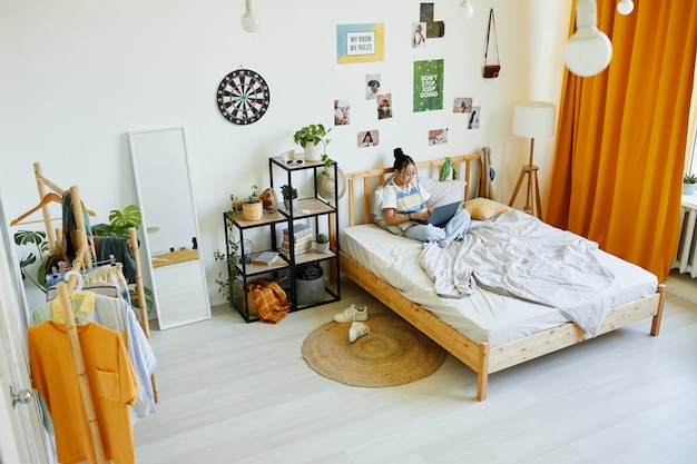 Teenage Girl in Her Room Wide Angle