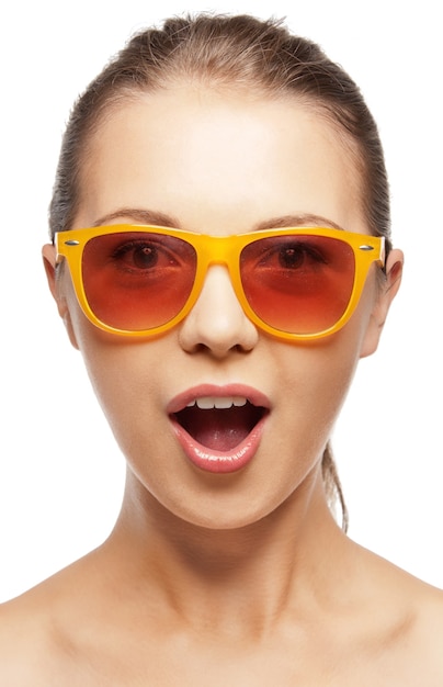 teenage girl in shades with expression of surprise