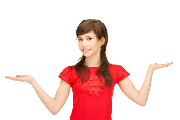 teenage girl showing something on the palms of her hands