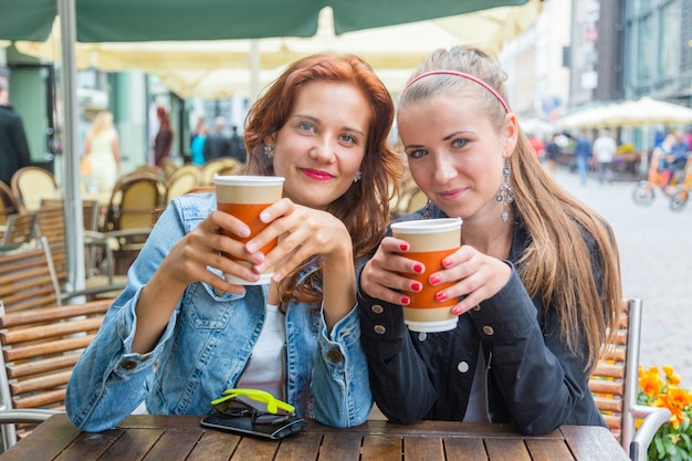 Teenage Girls Drinking at Bar