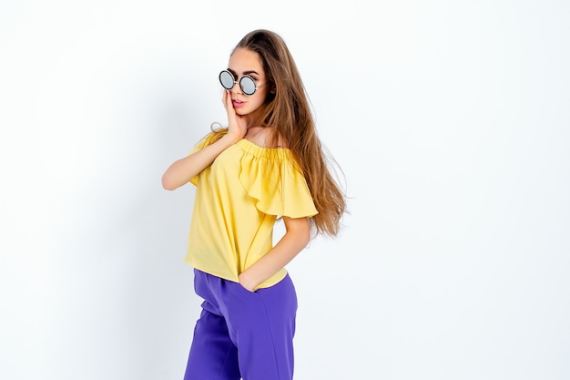 Teenage model with messy hair posing in casual clothes