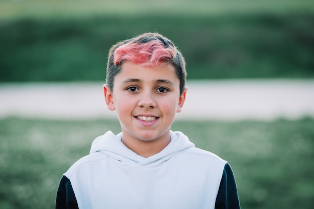 Teenager boy with hair painted