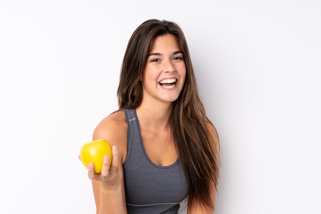 Teenager Brazilian girl with an apple