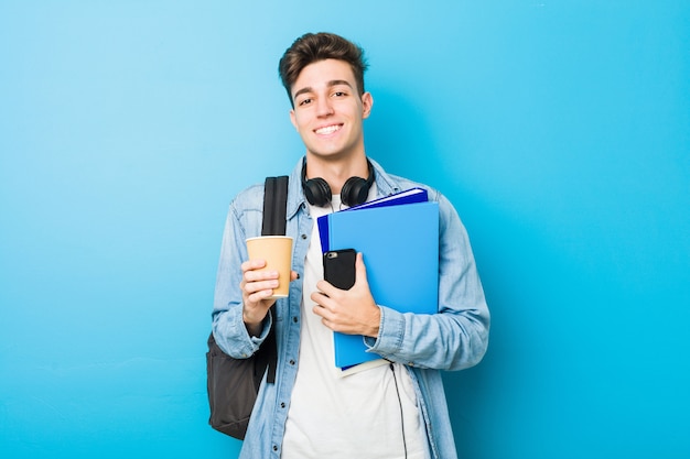 Teenager caucasian man ready to go to school