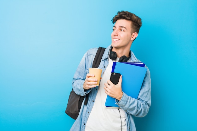 Teenager caucasian man ready to go to school