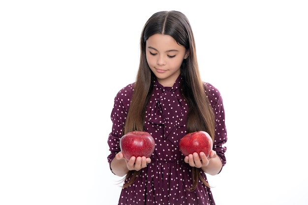 Teenager child with apple on white isolated background apples are good for children