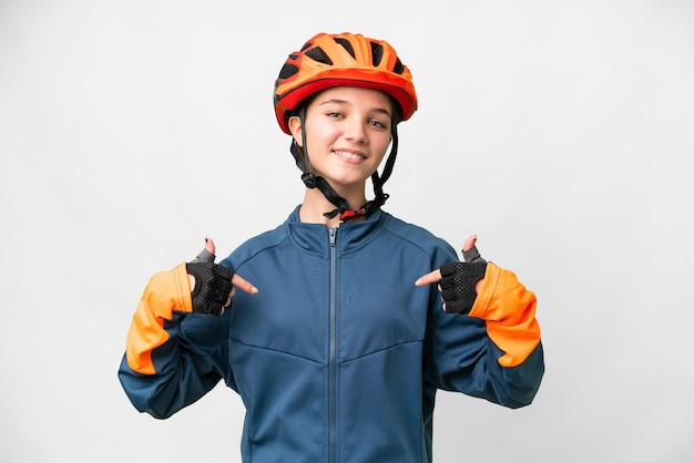 Teenager cyclist girl over isolated white background proud and selfsatisfied