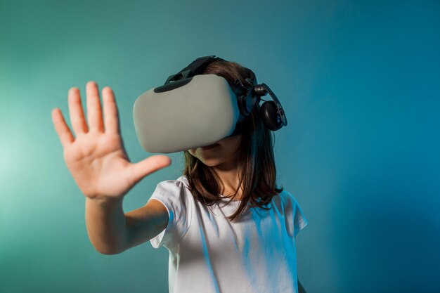 Teenager girl using a gaming gadget for virtual reality