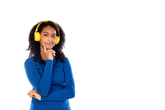 Teenager girl wearing blue sweater isolated on a white wall