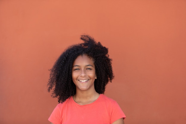 Teenager girl with a beautiful afro hair 