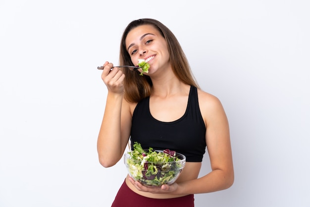 Teenager girl with salad